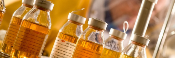 Sterile samples prepared for sterility testing of pharmaceutical and medical device products in a microbiology laboratory.