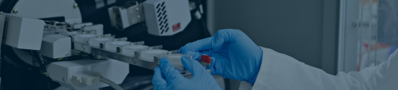 Scientist operating X-ray diffraction equipment for solid-state analysis in a GMP laboratory